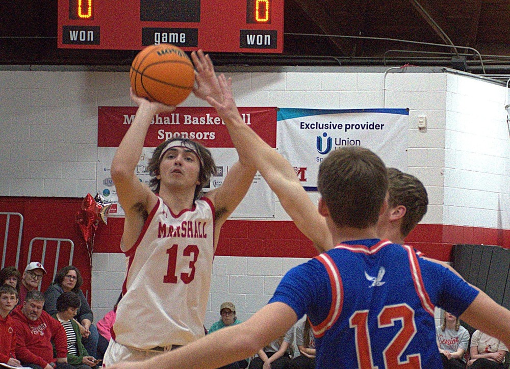 Payton McGuire (13) was hot all game long in scoring 37 points and grabbing 8 rebounds to go along with 2 assists & 3 steals on Senior Night