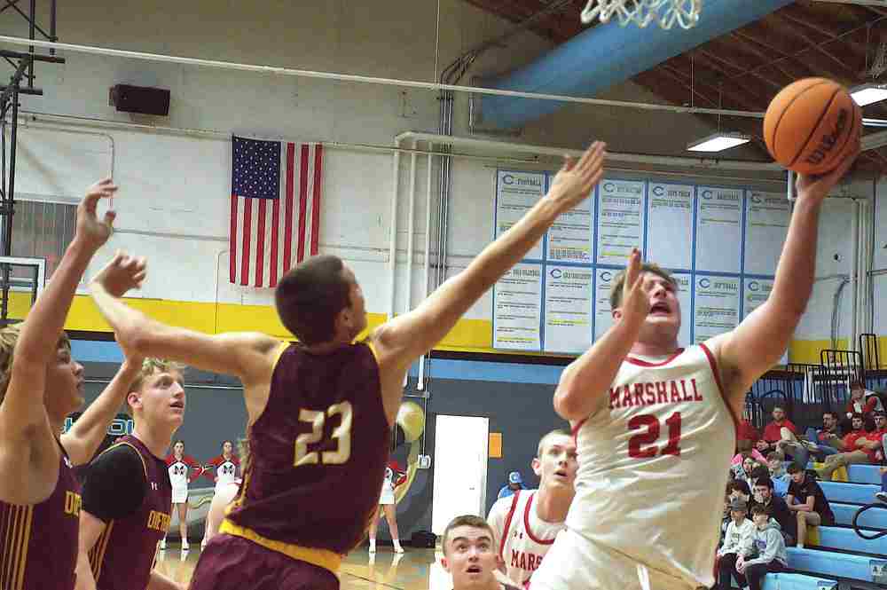 Garrett Pugh scores at the rim against Dietrich