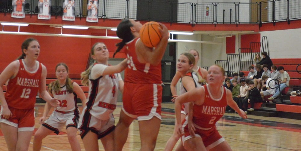 Ella Mattas grabs a rebound in traffic