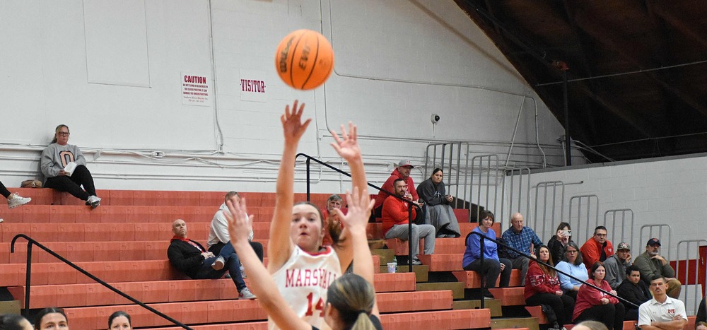 Marlee Heighton splashes home a three-pointer 