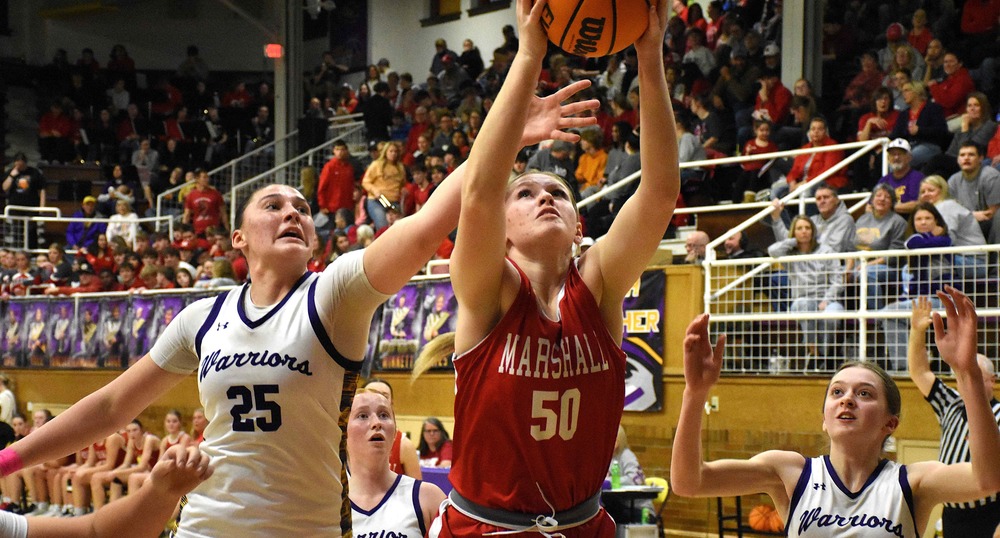 Kyla Gustafson (50) fights for position and gets the rebound against Casey-Westfield