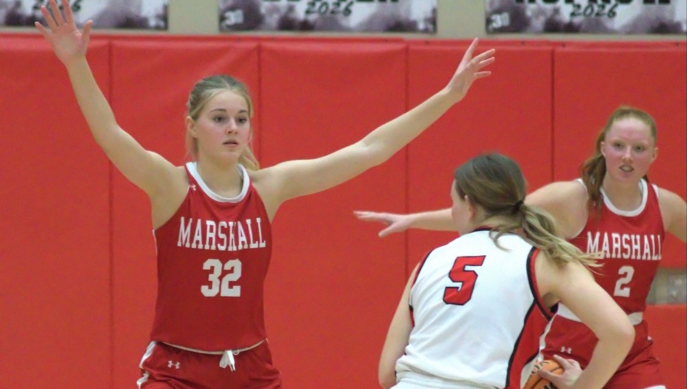 Harper Richardson and Lynn Welborn defend against Lawrenceville