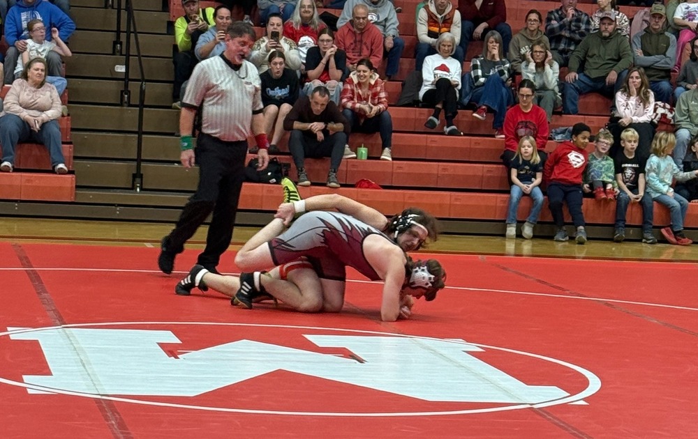 Gage Kent wins his match at McNary