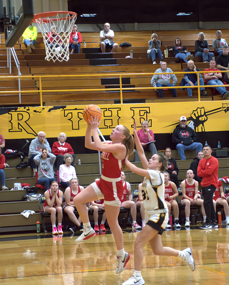 Lynn Welborn goes up for 2 of her team high 21 points