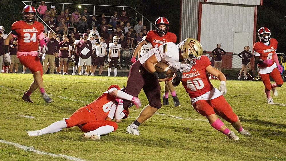 Silas Dean and Lucca Giannavola take down a Mt. Carmel rusher