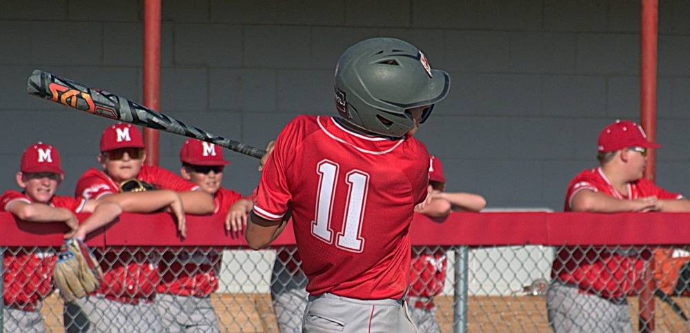 Cooper Bayes swings the bat