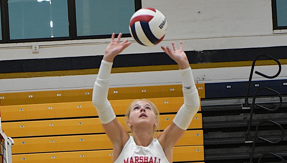 Harper Richardson (3) sets the ball for a strike against T-Town