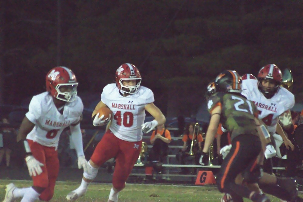 Lucca Giannavolla (40) turns the corner against Olney
