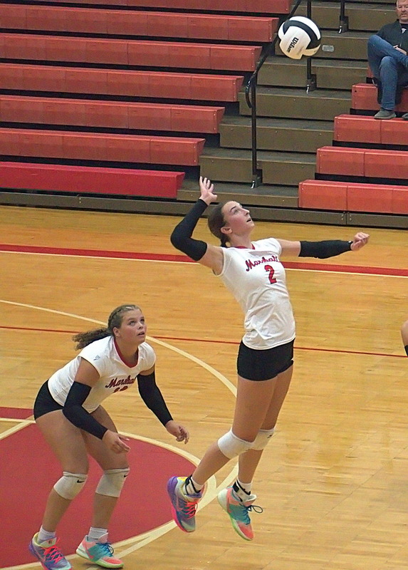 Lilly Ross (2) drills a spike from behind the attack line versus Chrisman