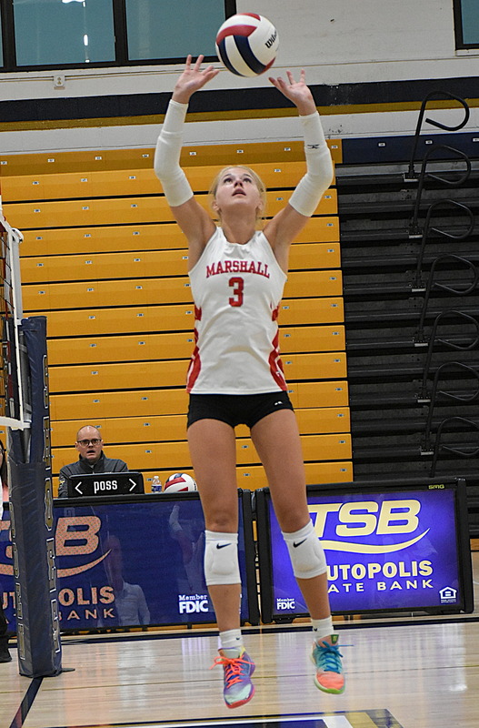 Harper Richardson (3) sets the ball for a strike against T-Town