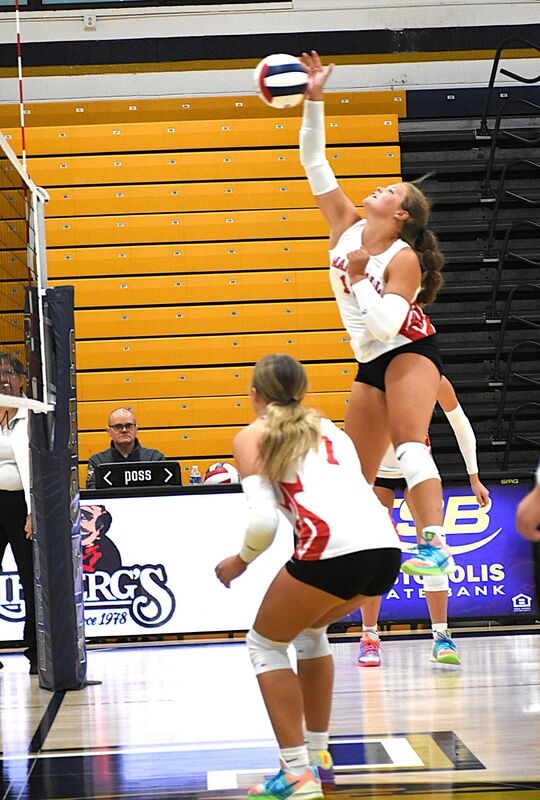 McKenzie Davis strikes the ball against Teutopolis