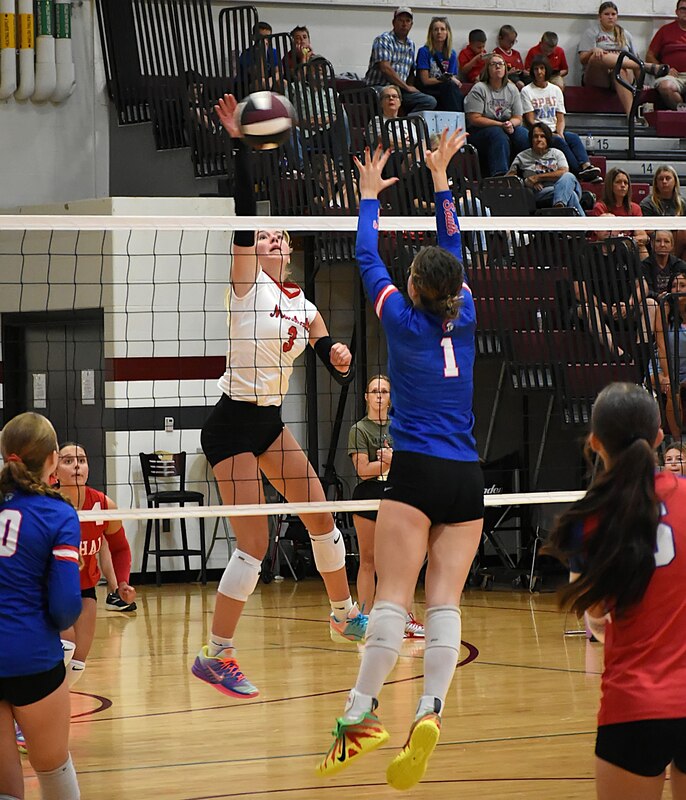 Harper Richardson hits a laser through the block at the Robinson tournament