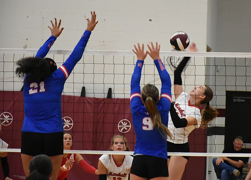 Libby Huisinga strikes a score with a kill against Indiana Class 2A ranked South Knox