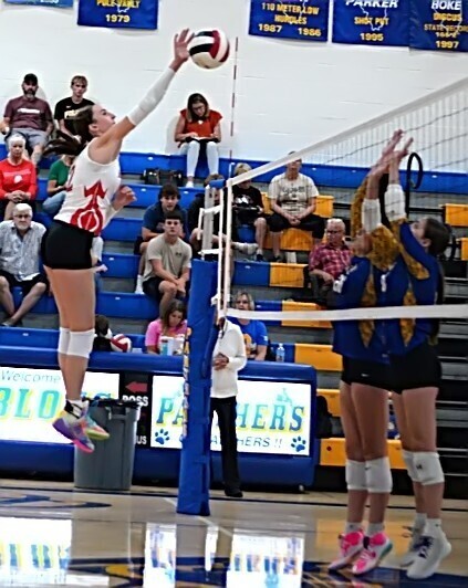 Lilly Ross laces a kill through the Oblong defense
