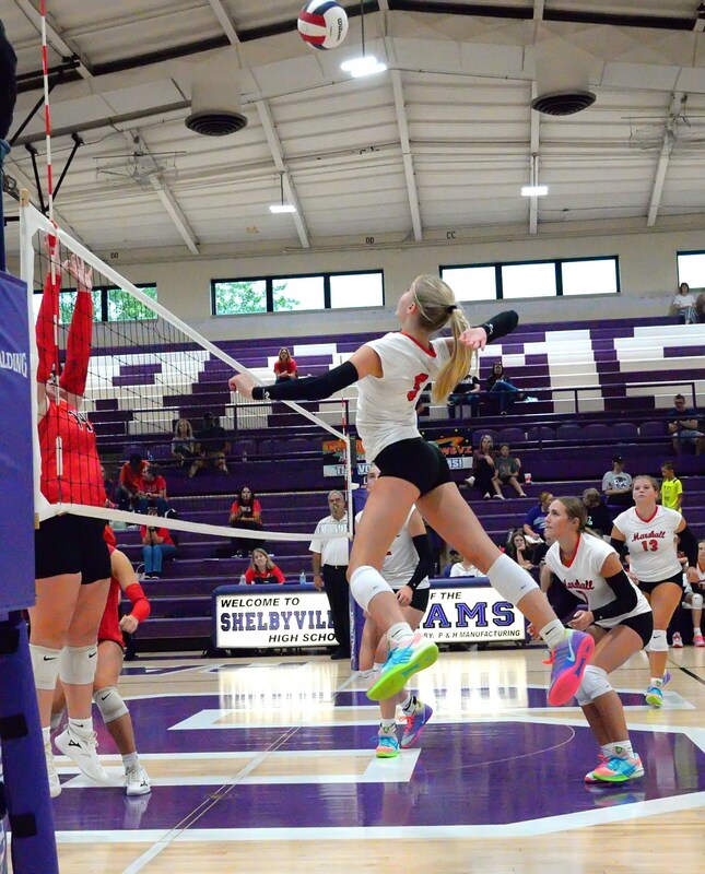 Harper Richardson (3) strikes a kill during action at the Shelbyville volleyball tournament