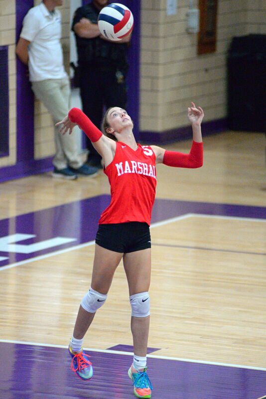 Lauren English (5) had an amazing streak of serving 9 straight Marshall points against Heritage