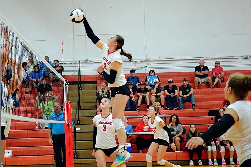 Lilly Ross (2) goes up and scores a kill for Marshall against Martinsville