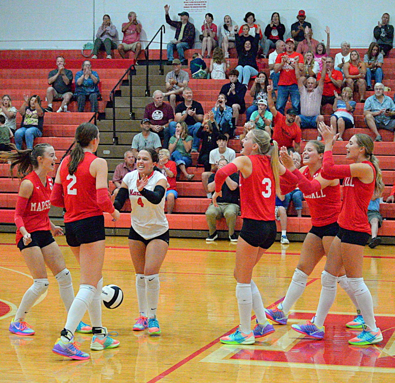 The Lions and their fans celebrate winning the second set against St Anthony