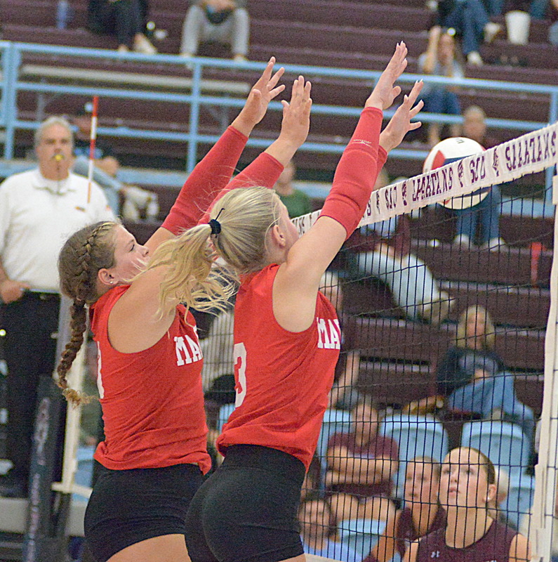 McKenzie Davis (L) and Harper Richardson (R) were a force blocking in the middle for Marshall at St Joe-Ogden