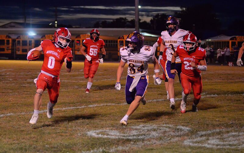 Silas Dean (0) broke outside for a big gain for Marshall