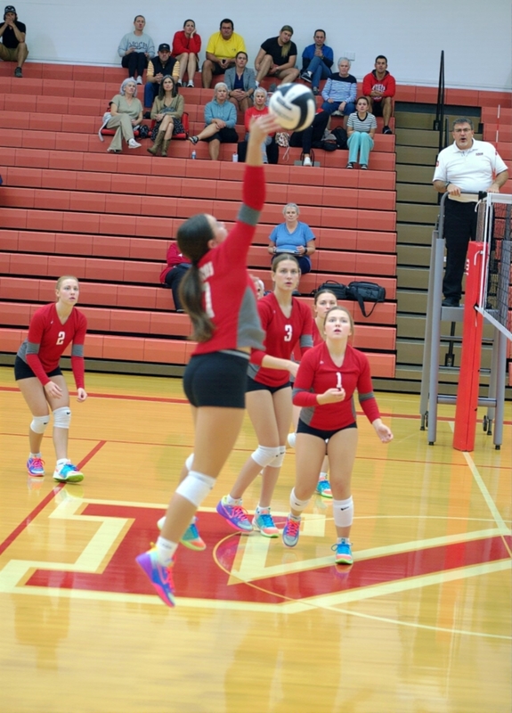 Lauren Richards (7) scores the winning point of the match for Marshall to beat St John's Lutheran in three sets