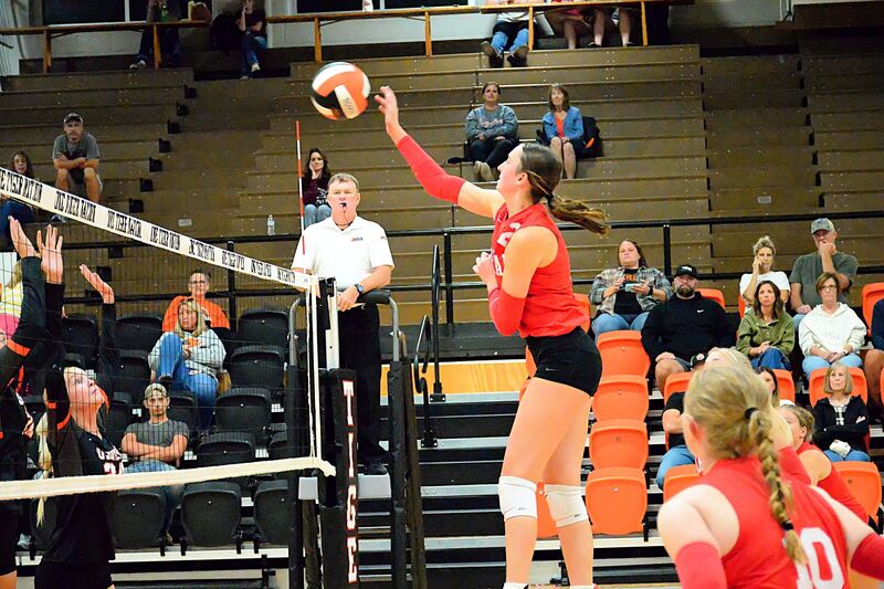 Lilly Ross goes up high to score a kill against Richland County