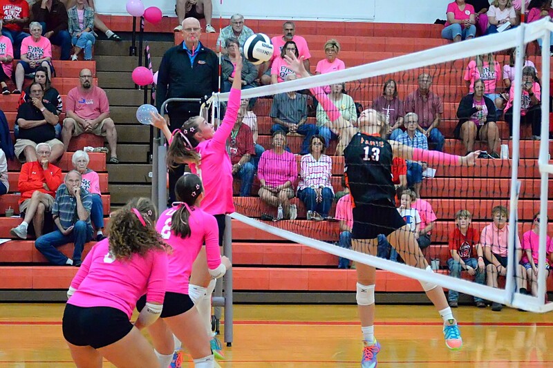 Marshall's Lauren English wins the battle at the net