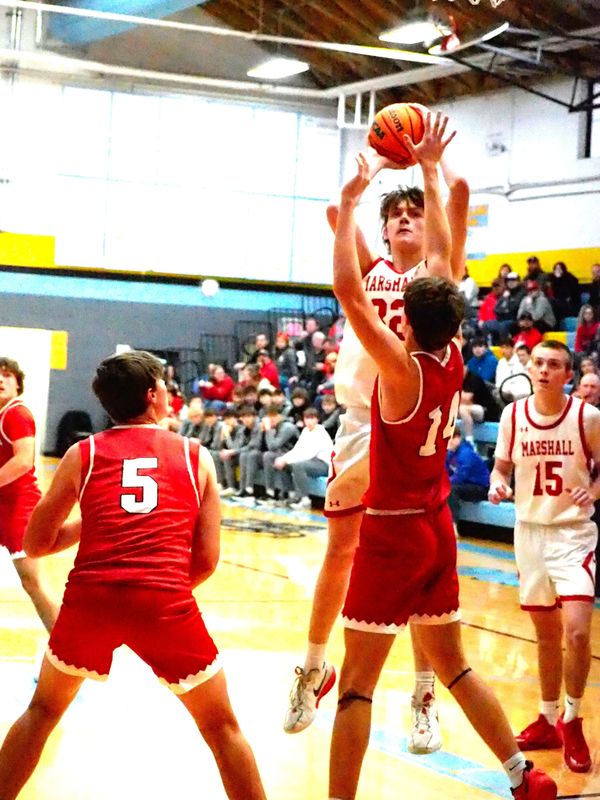 Zach Jones goes up for the score