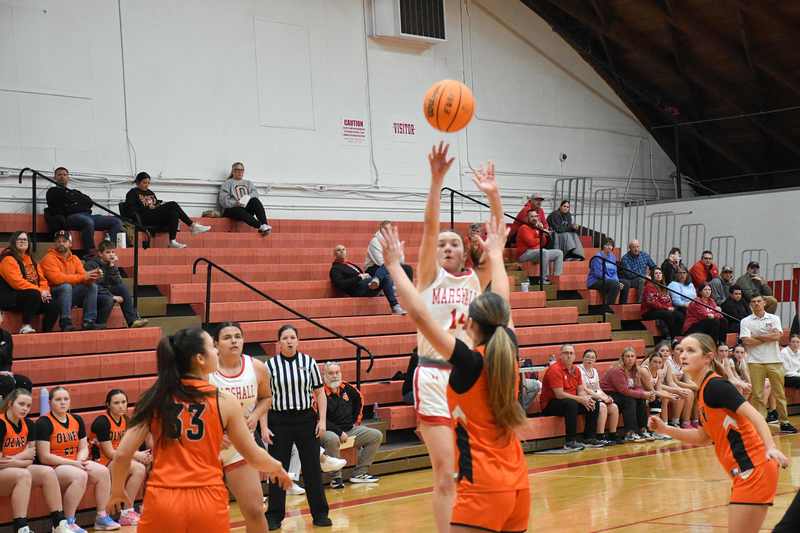Marlee Heighton splashes home a three-pointer on her way to scoring 16 points against Olney in Marshall's big win