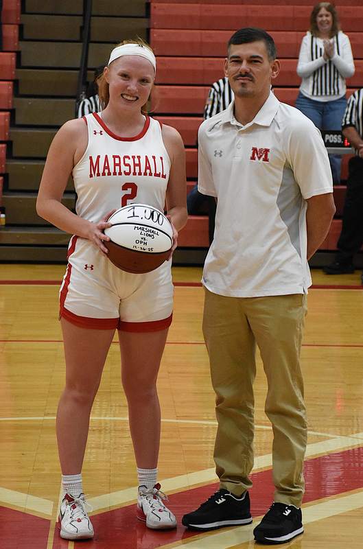 Lynn Welborn and Girls Basketball Head Coach Michael Henry