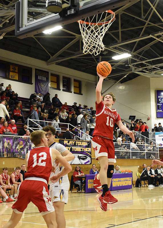 Brady Landrus (10) had a nice shooting night for Marshall during the JV game