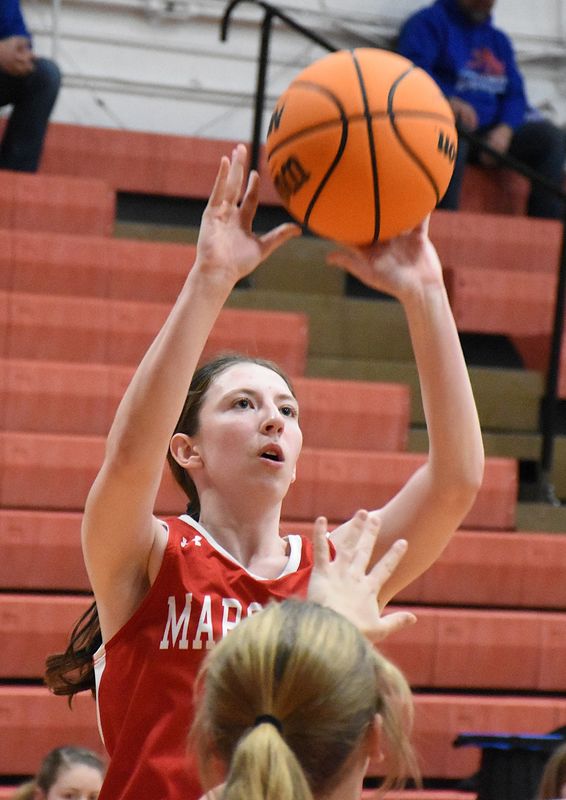 Addy Ross puts up a shot for Marshall against Newton in the LIC Tournament