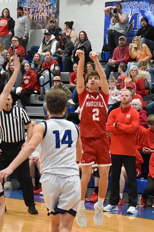 Tucker Osborn (2) knocked down three 3-pointers in Marshall's win over Martinsville