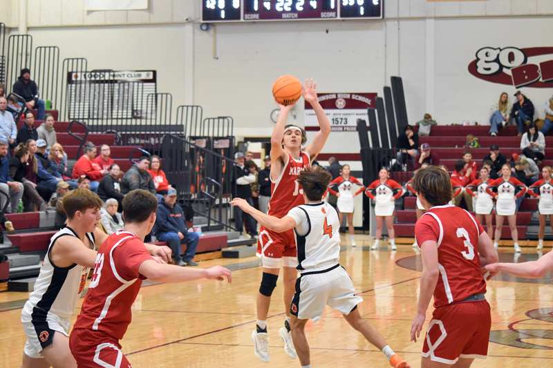 Payton McGuire rains down a triple against Olney
