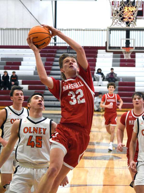 Zach Jones made a big steal and breakaway score to help Marshall stay out in front of Olney