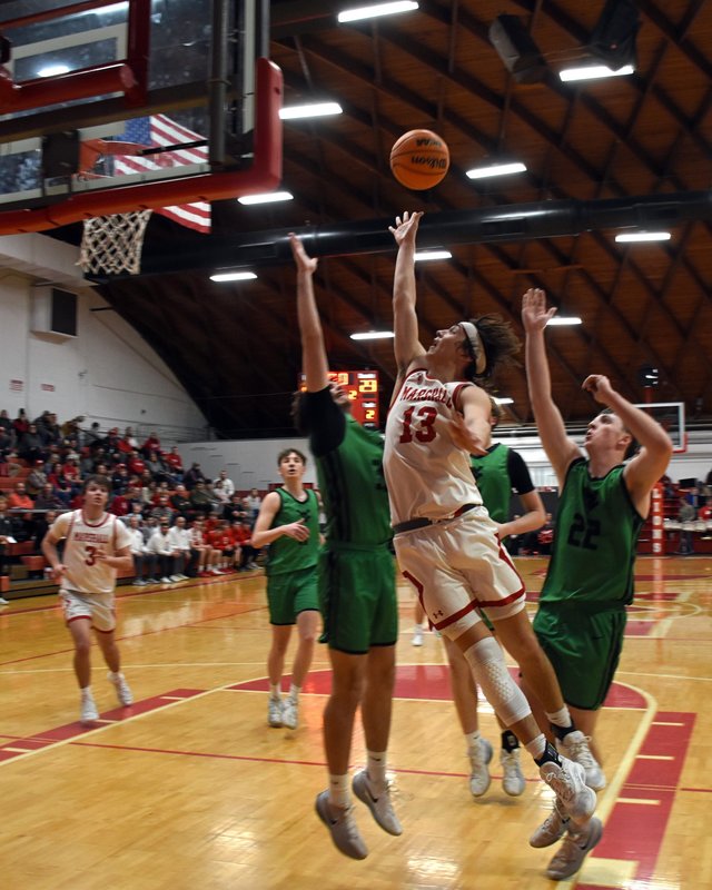 Payton McGuire goes up inside against West Vigo - McGuire finished with 15 points