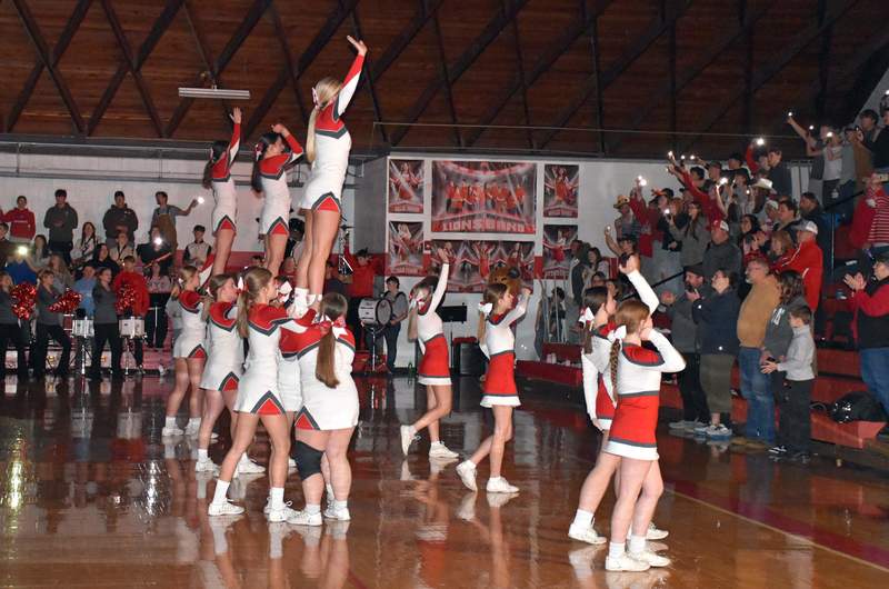 Marshall High School cheerleaders lead the crowd during player introductions (1)