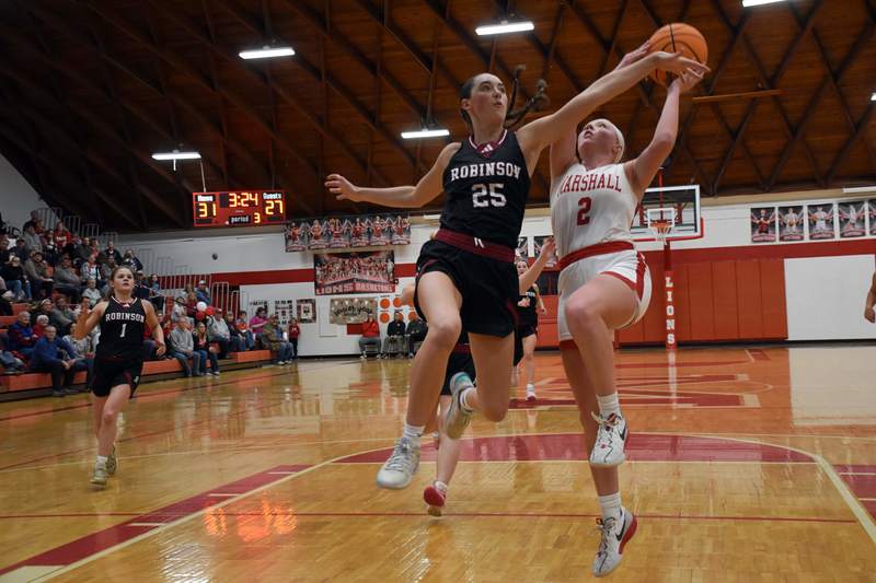 Lynn Welborn scores 2 of her team-high 21 in the big win over Robinson