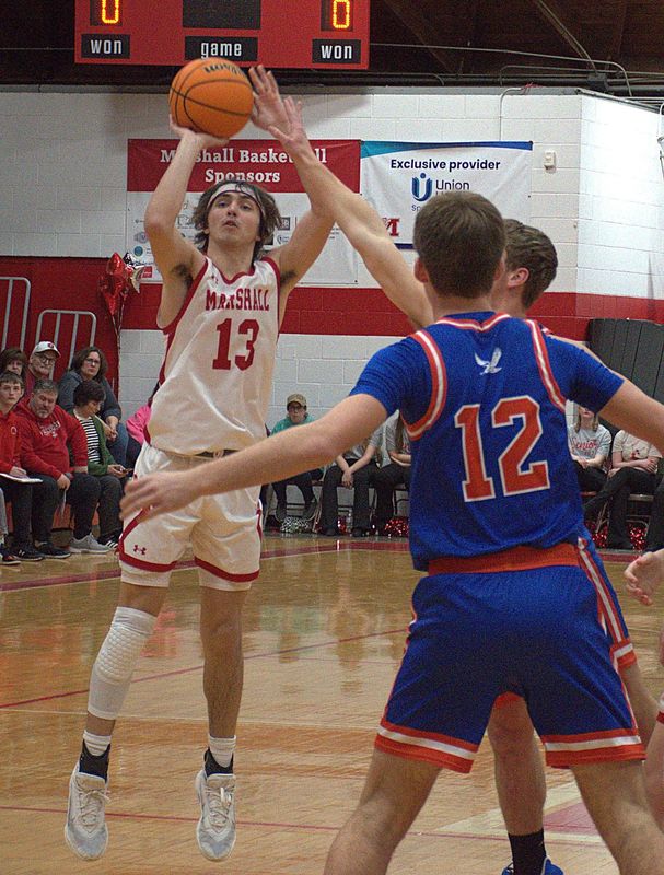 Payton McGuire (13) was hot all game long in scoring 37 points and grabbing 8 rebounds to go along with 2 assists & 3 steals on Senior Night