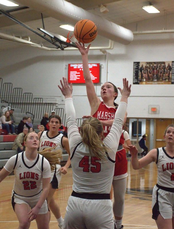 Marlee Heighton drops in 2 of her 18 points against Edwards County