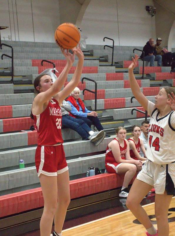 Lilly Ross (22) dialed up five three-pointers on her way to scoring 17 points in the JV game against Edwards County