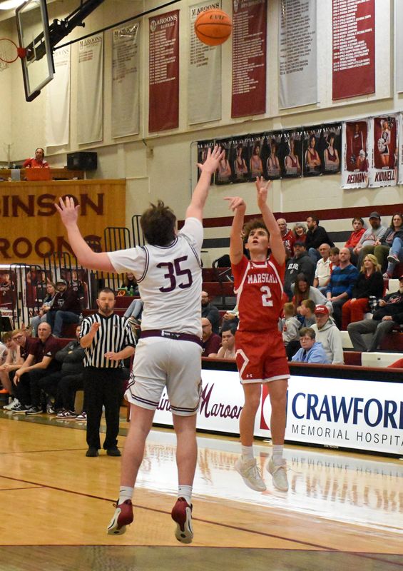 Tucker Osborn (2) finished with 14 points, 7 rebounds, and 7 axsists for Marshall vs Robinson