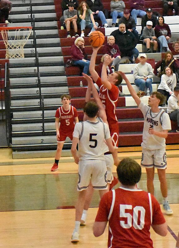 Tommy Sheehy drops in a shot for Marshall against Robinson