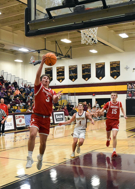 Liam Keim (3) had a big steal and score to go along with 7 assists for Marshall against Clinton