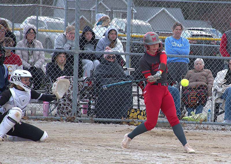 Avery Cornwell goes yard with a two-run homer against Salt Fork in Marshall's 15-5 win
