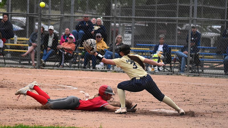 Lilly Nickles steals second base during Marshall's win over the Wooden Shoes