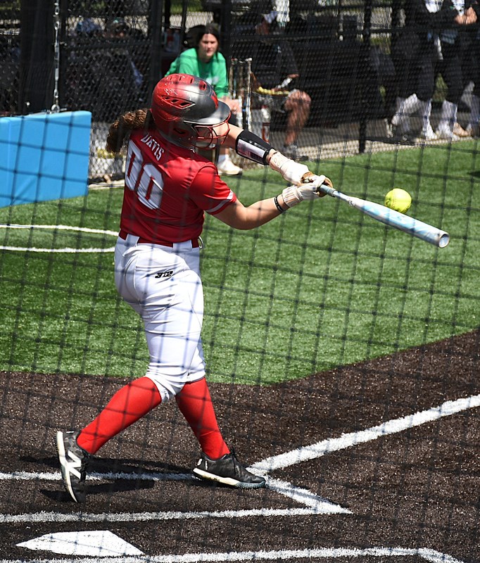 McKenzie Davis crushes a home run against Meridian at the St Joe-Ogden tournament