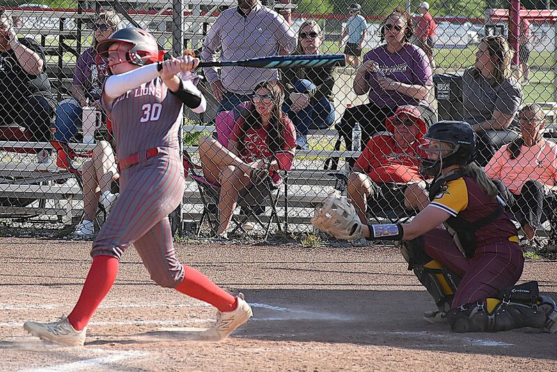 Lynn Welborn smashes a double to the fence in center field during Marshall's 16-0 win over Dieterich