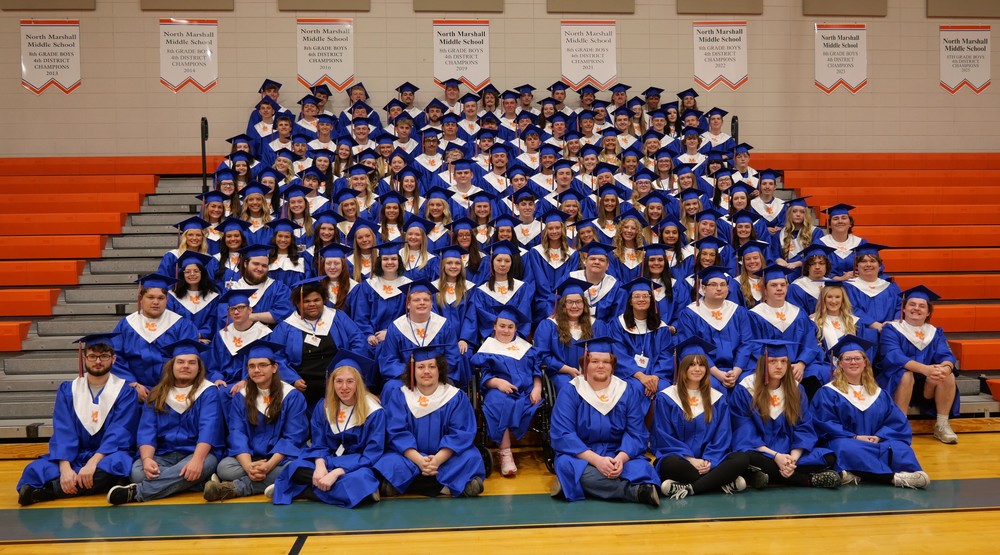 MCHS Seniors who attended NMMS pose for picture in gym