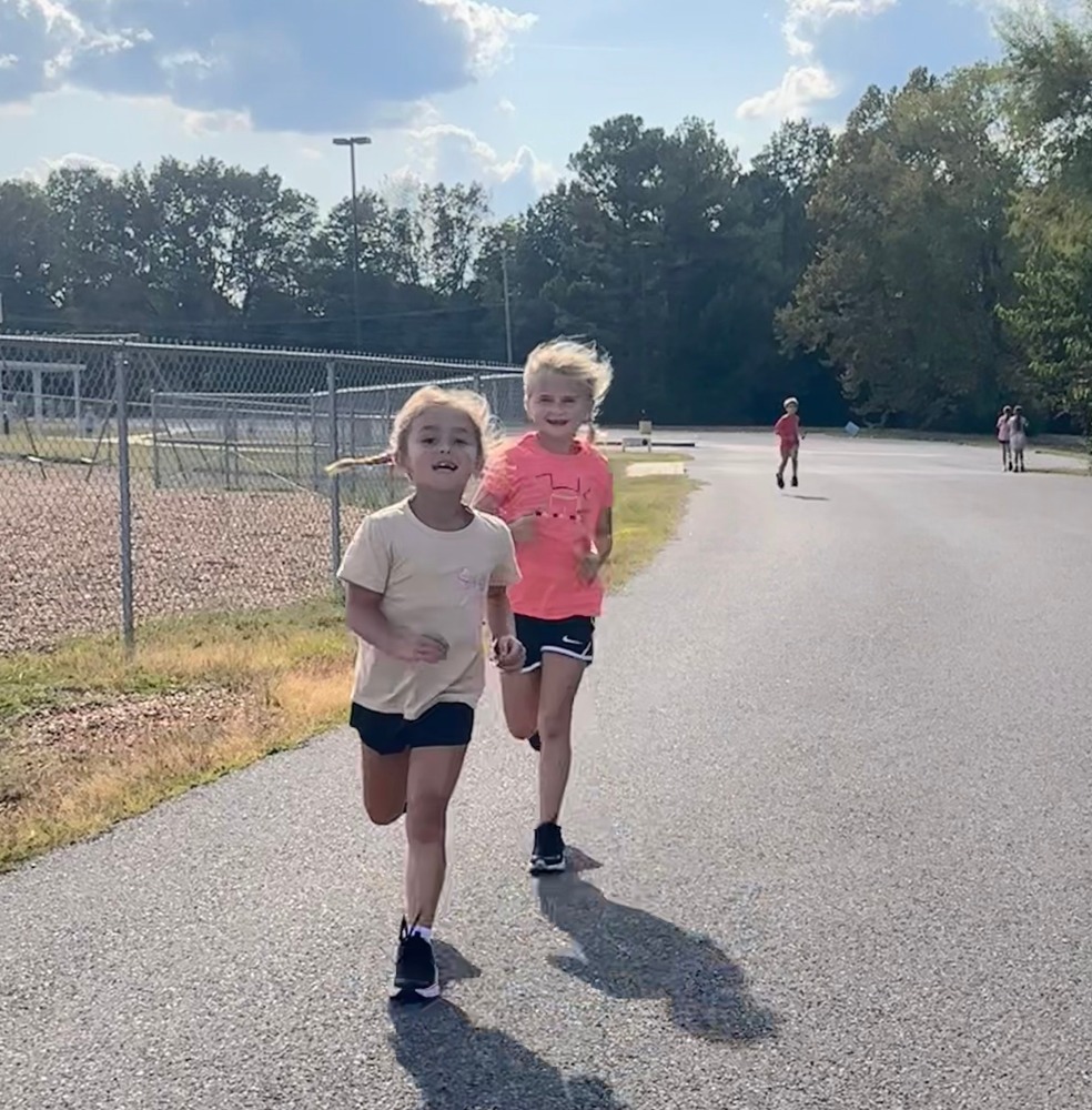 2 SES Students Running